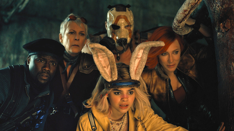 The Vault crew crowd together and peer into the distance in "Borderlands" (2024)