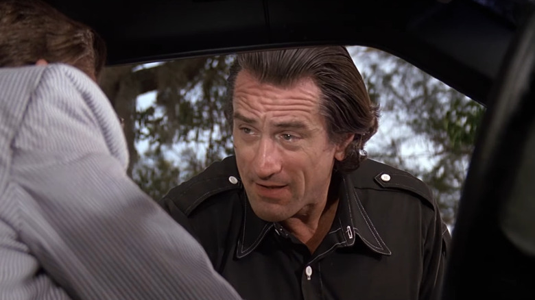Max Cady looking into a car in Cape Fear (1991)