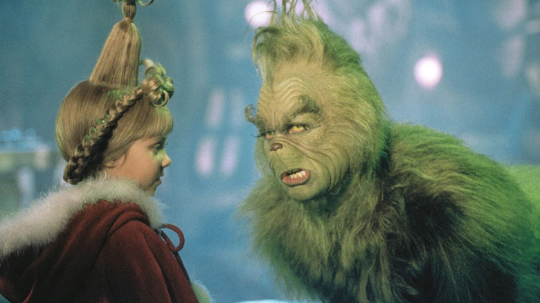 The Grinch frowning to Cindy Lou Who in "How the Grinch Stole Christmas."