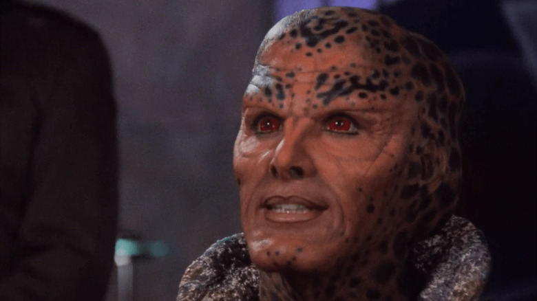 Orange skinned alien Na'Toth glowers with her red eyes in "Babylon 5"