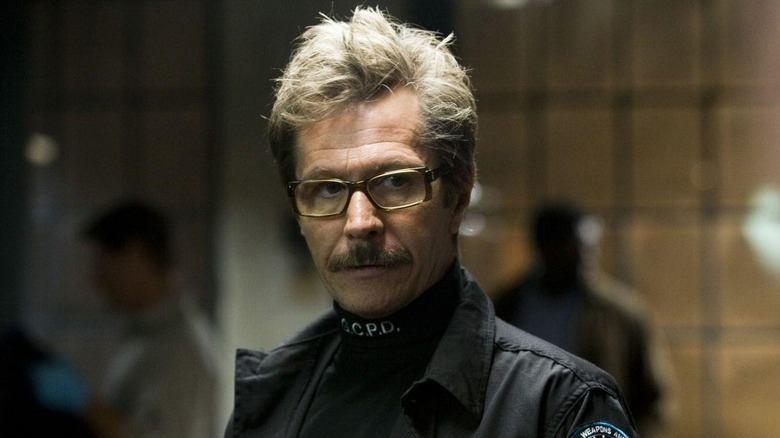 Commissioner Gordon observing The Joker in The Dark Knight (2008)