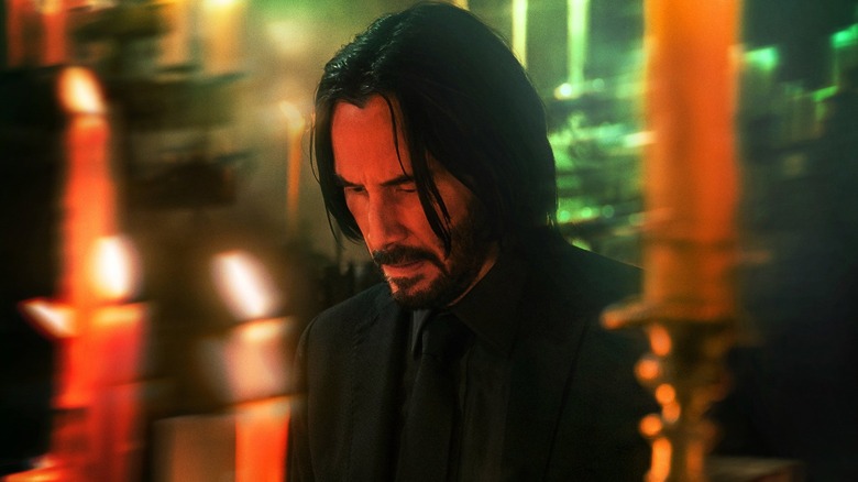 John Wick amongst the candles in John Wick: Chapter 4 (2023)