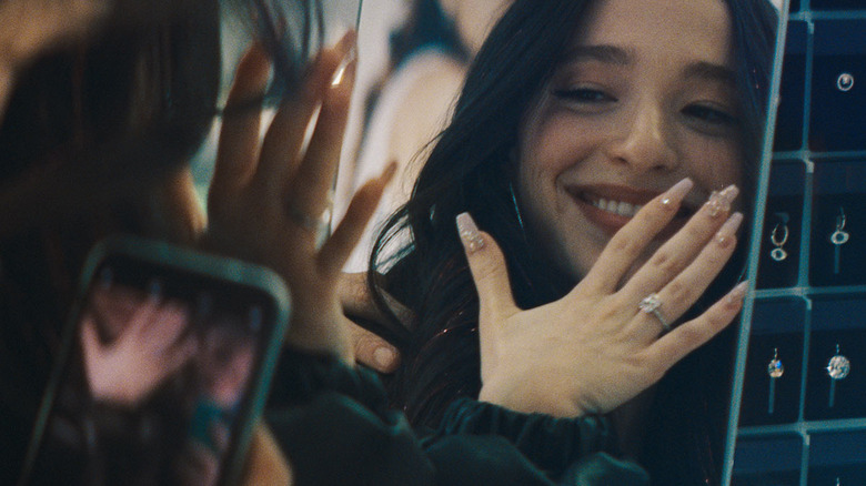 Ani savoring her ring in Anora (2024)