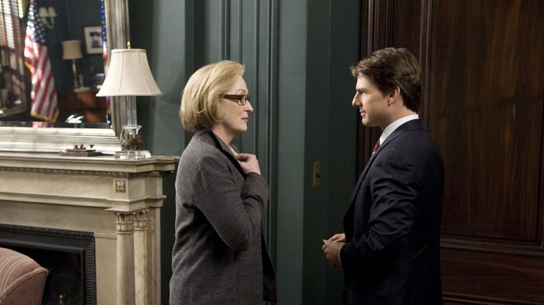 Janine Roth interviewing Senator Jasper Irving in Lions for Lambs (2007)