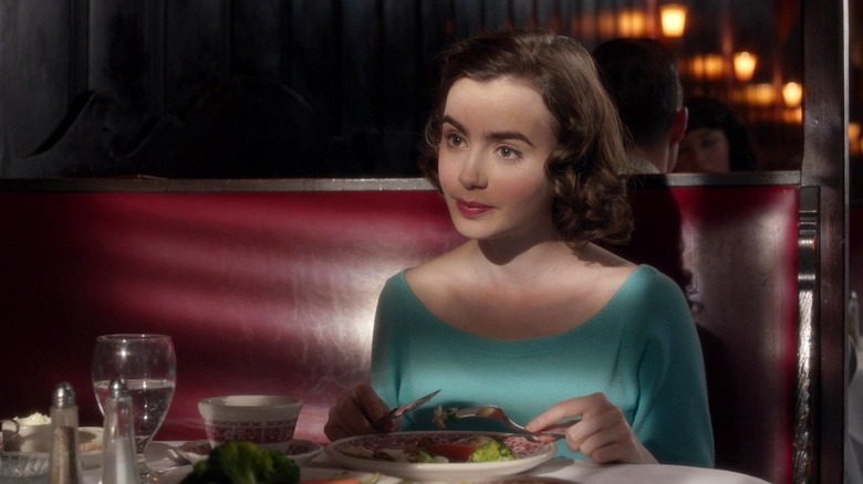 Marla Mabrey eating a fancy meal in Rules Don't Apply (2016)