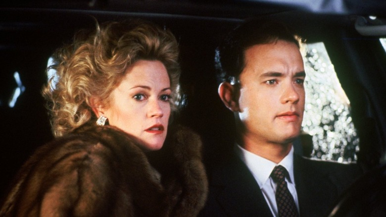 Maria Ruskin and Sherman McCoy assessing a situation in The Bonfire of the Vanities (1990)