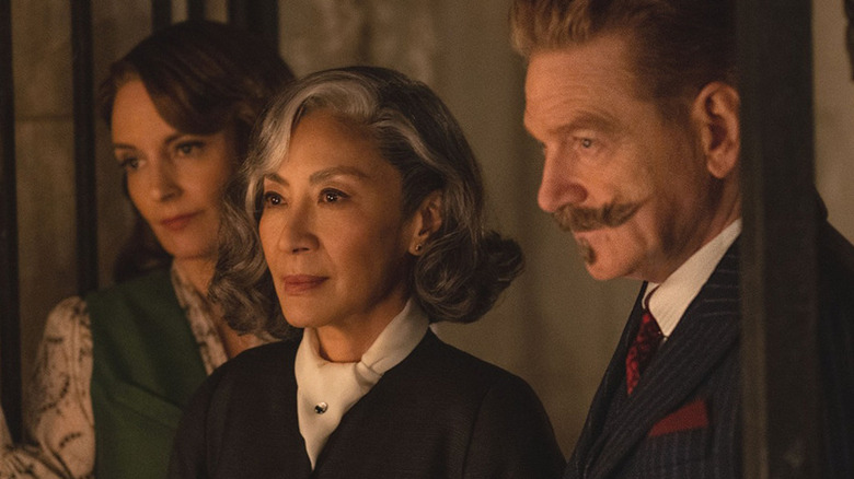 Ariadne, Joyce, and Hercule Poirot frowning in "A Haunting in Venice."