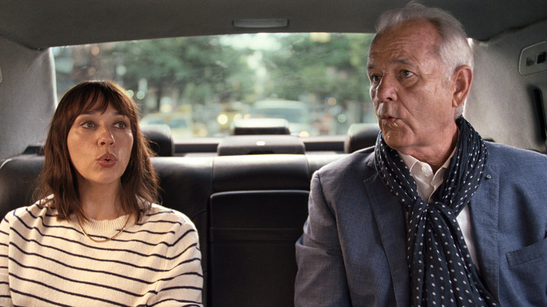 Laura and Felix whistling together in "On the Rocks"