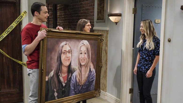 Amy and Sheldon present Penny with a painting in "The Big Bang Theory"