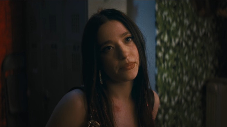 Ani looking displeased with her head tilted in Anora (2024)