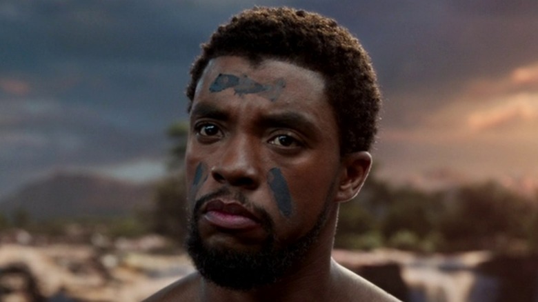 Boseman with paint on face