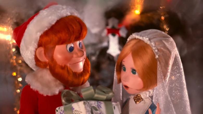 Santa sharing a gift with Jessica in Santa Claus Is Comin' to Town (1970)