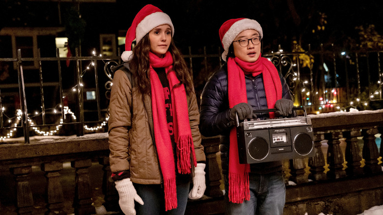 Natalie and Josh caroling with boom box
