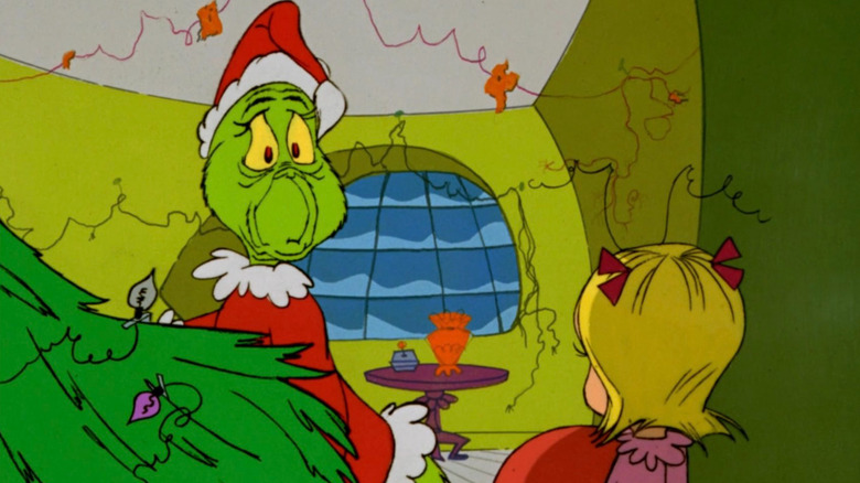 Grinch being spotted by Cindy Lou Who in How the Grinch Stole Christmas