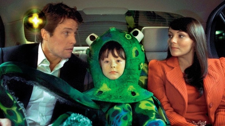 David and Natalie in the back of a car in Love Actually