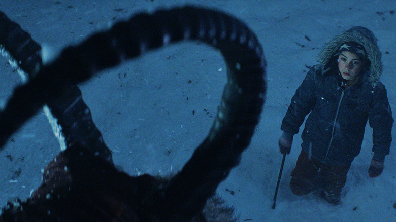 Max Engel looking up at Krampus in Krampus