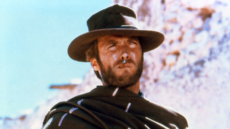 The Man with No Name smokes a cigar in "A Fistful of Dollars" (1964)