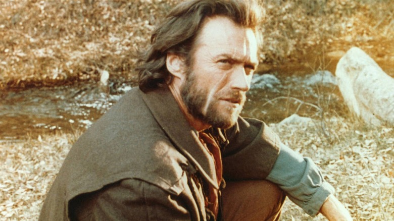 Josey Wales sitting on the ground looking up