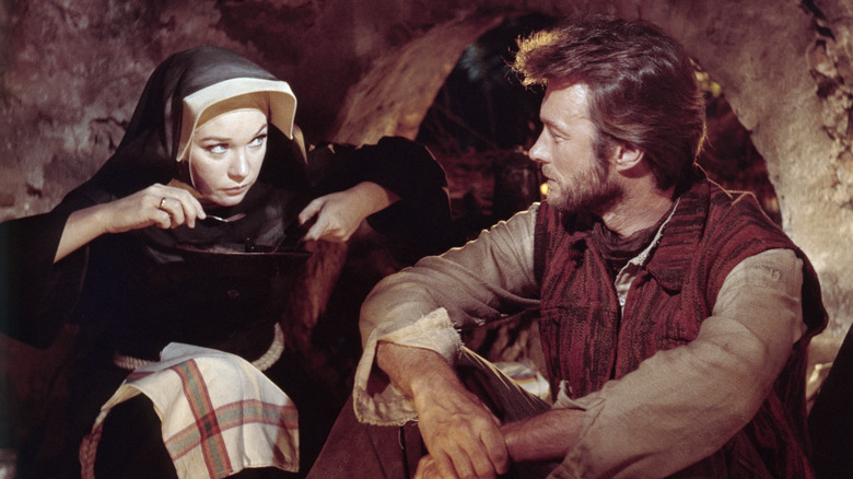 Hogan and Sister Sara chat in an adobe in "Two Mules for Sister Sara" (1970)