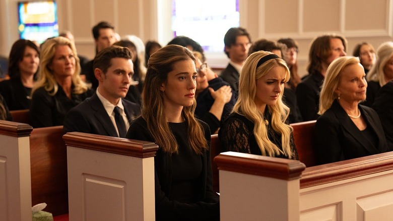 Morgan and Clara sitting in a church pew in "Regretting You"