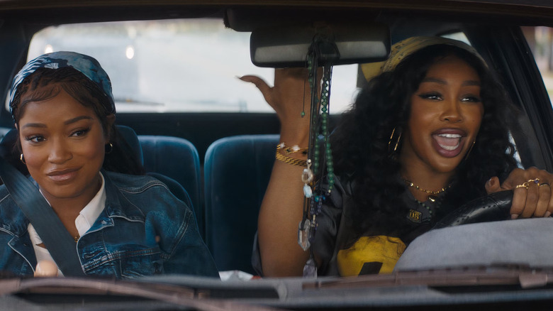 Dreux riding shotgun in Alyssa's car after her shift in 