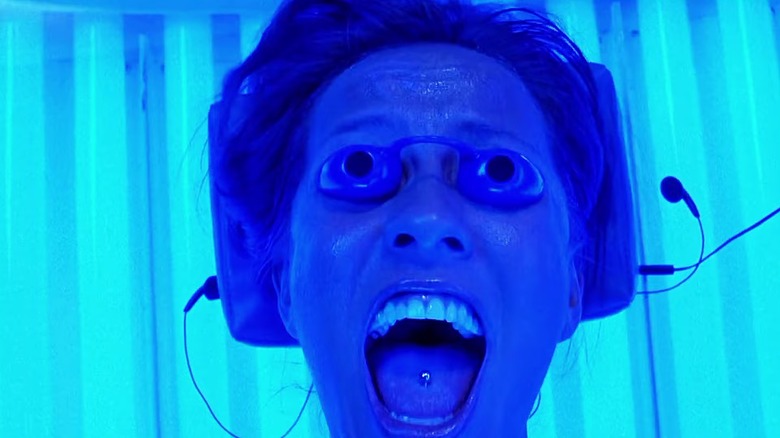 Ashley in the tanning bed, screaming in blue light, in "Final Destination 3" (2006)