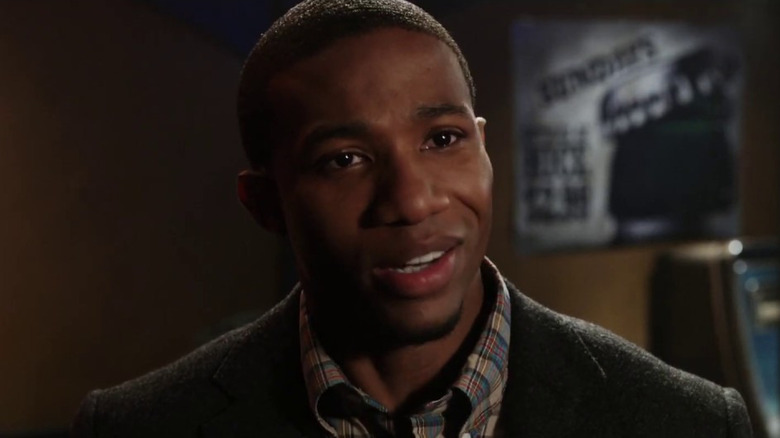 Nathan looks forward while in a bar shortly before his death in "Final Destination 5" (2011)