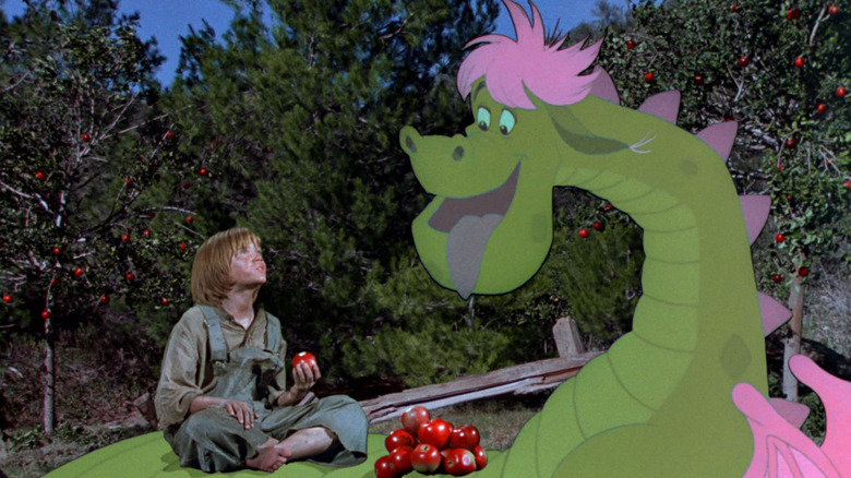 Pete eats apples with his dragon in "Pete's Dragon" (1977)