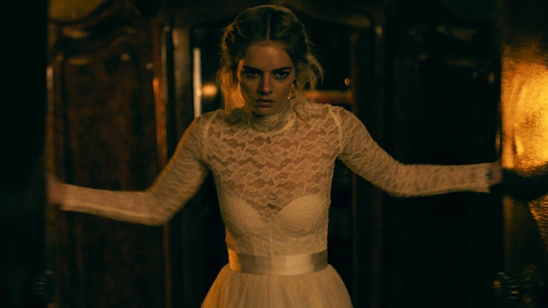 Grace furious in a doorway in "Ready or Not" (2019)