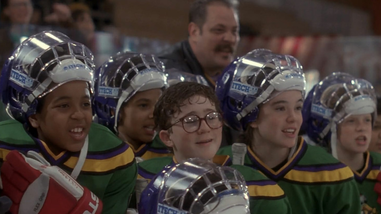Mighty Ducks team standing in front of bench after game