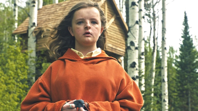 Charlie holding a bird in Hereditary (2018)