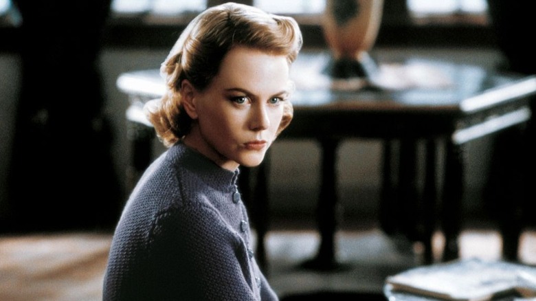 Grace Stewart sits alone in a mansion in The Others (2001)