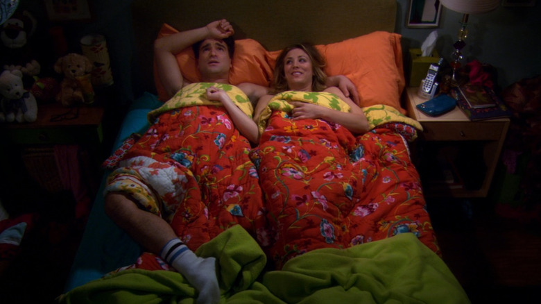 Leonard and Penny laying in bed together in The Big Bang Theory (2007)
