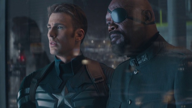 Steve Rogers and Nick Fury inspecting S.H.I.E.LD.'s new ships in "Captain America: The Winter Soldier" (2014)