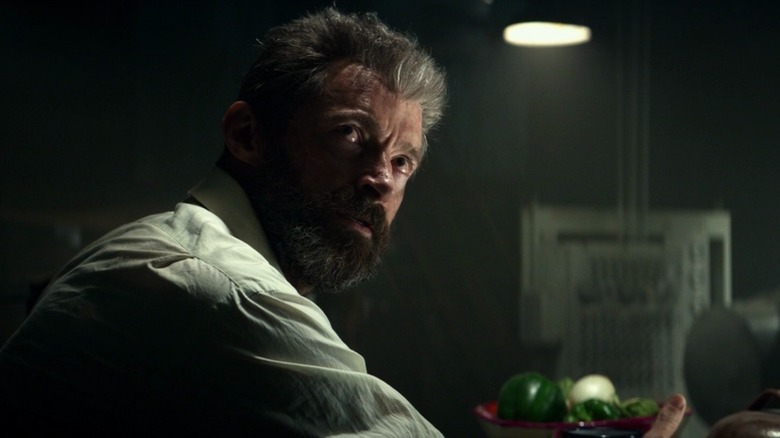 A weary Logan looking upward in "Logan" (2017)