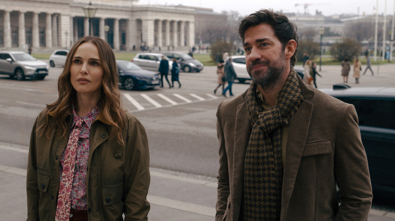 Charlotte and Luke standing outside in Fountain of Youth (2025)