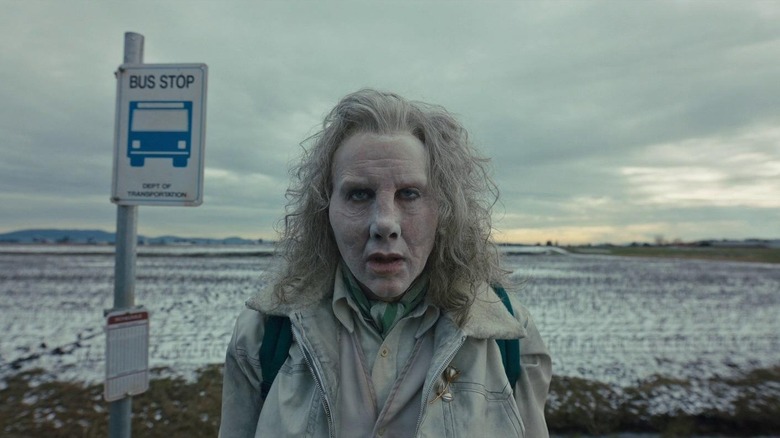 Longlegs by a bus stop in Longlegs