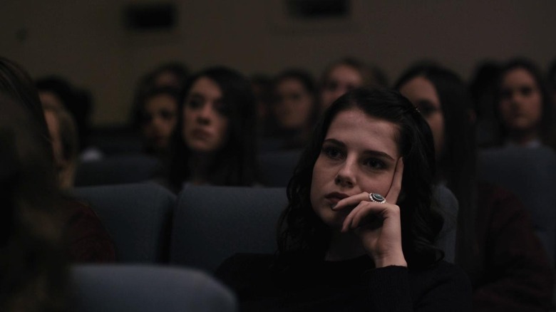 Rose looking bored in class in The Blackcoat's Daughter