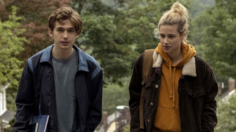 Henry and Grace walking in the woods in "Chemical Hearts" (2020)