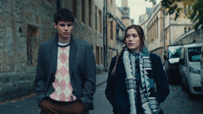 Kent and Caro walking down a street in "Surprised by Oxford" (2022)