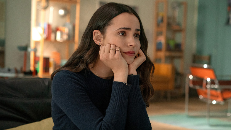 Alex sitting with her head in her hands in "The Life List" (2025)