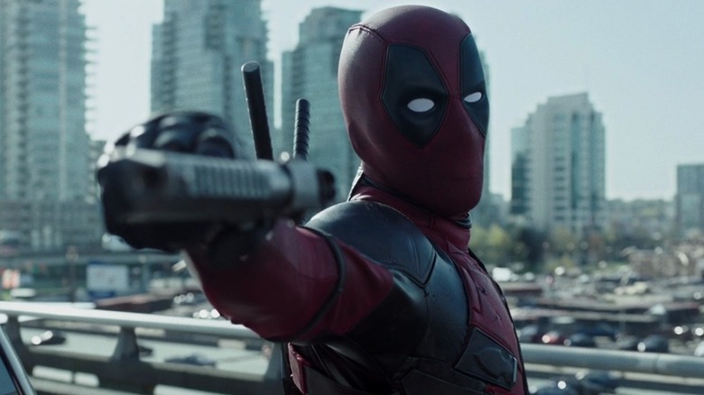 Deadpool aims a gun in Deadpool