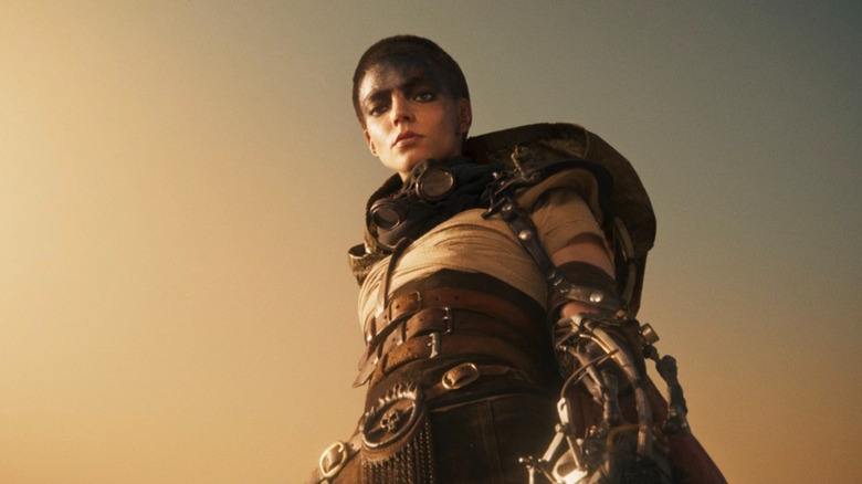 Furiosa looking down in "Furiosa: A Mad Max Saga"