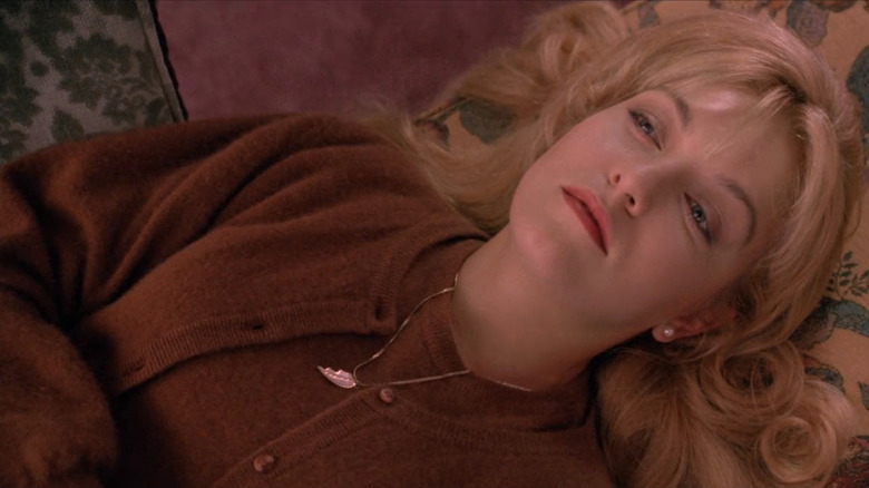Laura Palmer lying on a couch in "Twin Peaks: Fire Walk With Me"