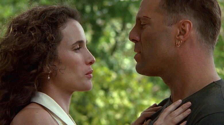 Anna and Hudson Hawk smiling in "Hudson Hawk."