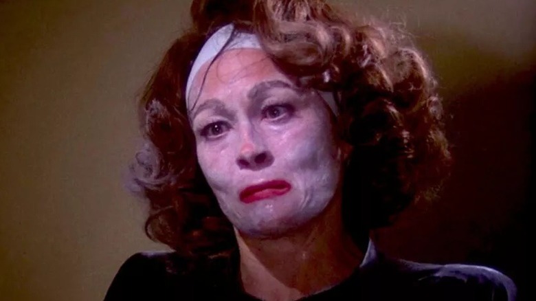 Joan Crawford wearing face cream in "Mommie Dearest."
