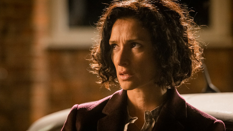 Nina looks concerned and looks off screen in Paranoid