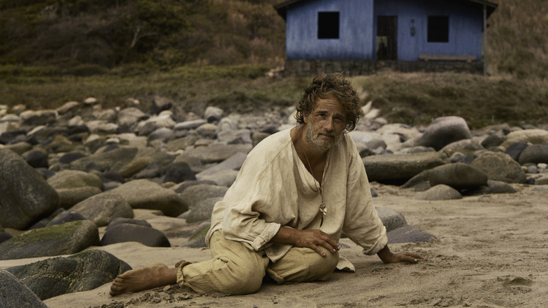 Crisostomo lying down on the beach in The Son of a Thousand Men (2025)