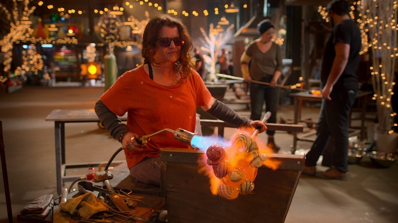 Andi blowing glass on "Blown Away: Christmas"
