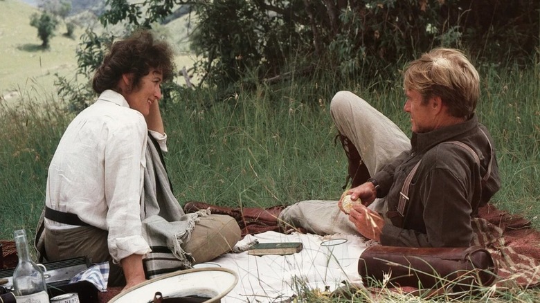 Karen and Denys enjoying a picnic in "Out of Africa"